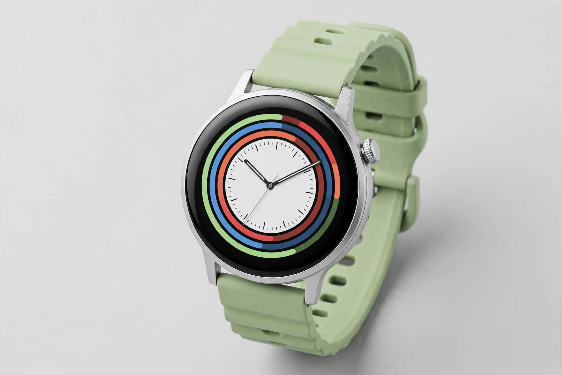 Round budget smartwatch with rotating crown and light green silicone strap